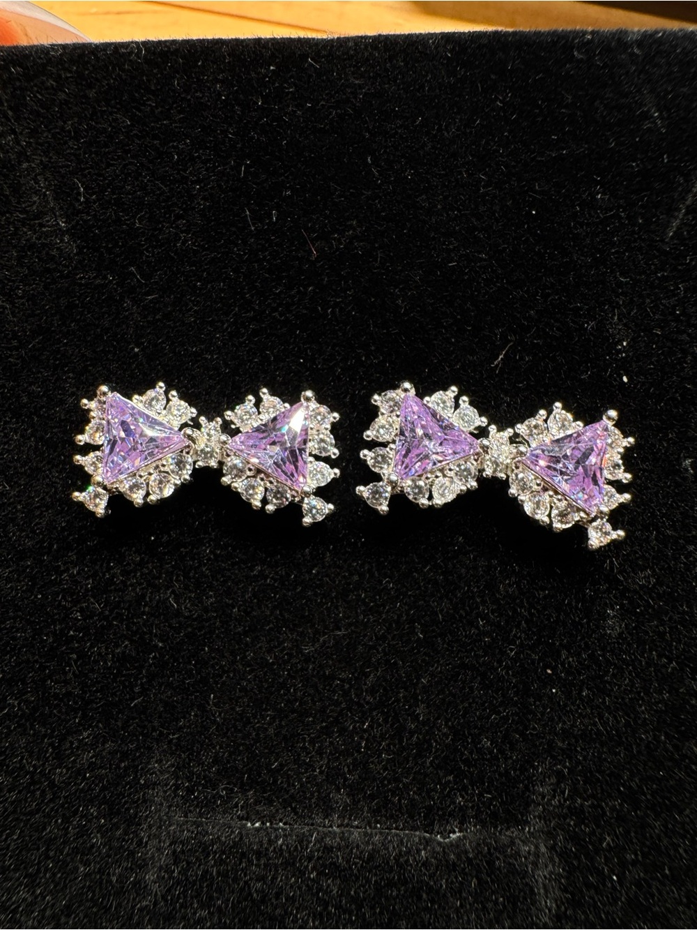 Silver Bow Stud Earrings with Purple Stones